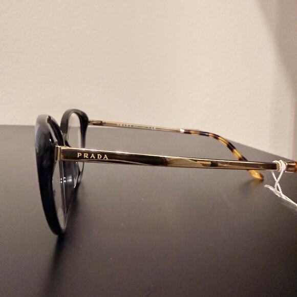 Prada Black and Gold Frames with Clear Lenses